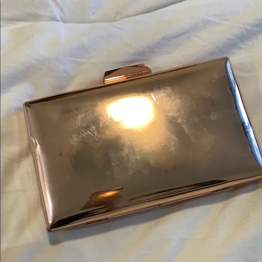 Rose gold clutch with chain strap